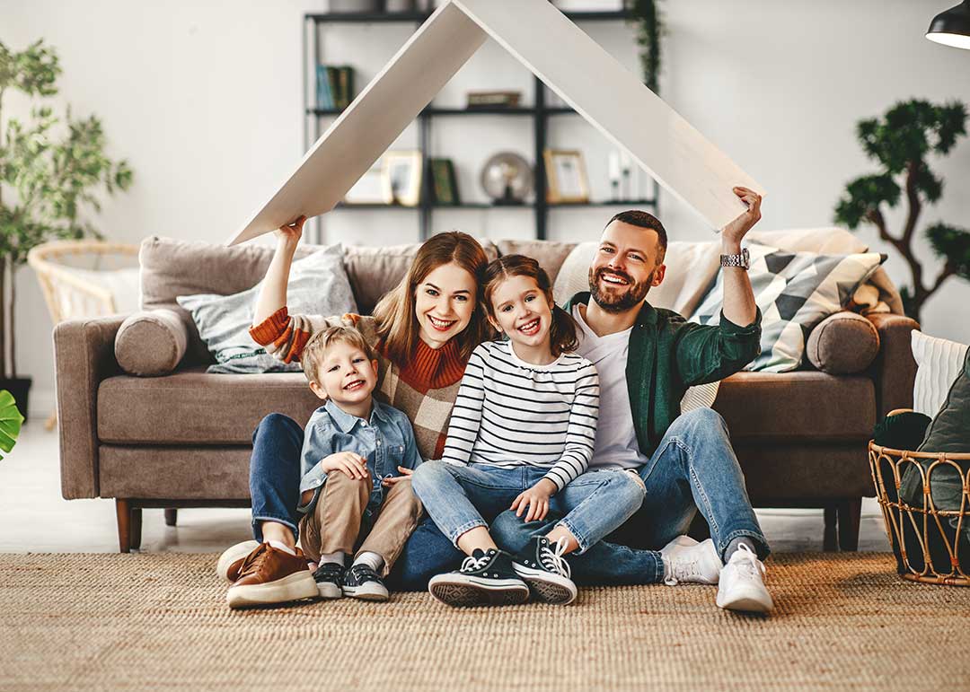 Family of four happy in new home | Realtor in Pine City, MN